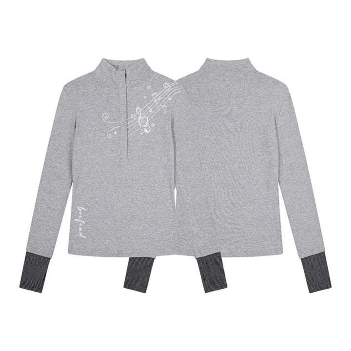 Damen Langarmshirt mit Henley-Knopfleiste, Kontrastbündchen und Notenprint Echoarchiv