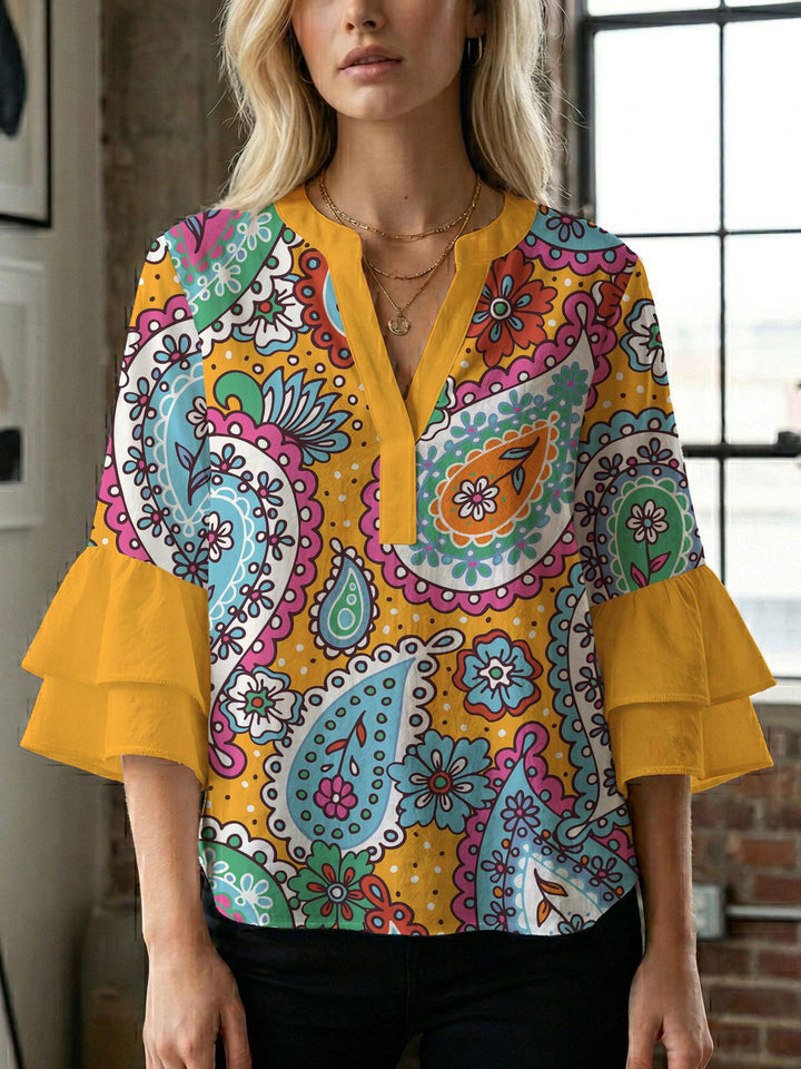 Damen Bluse mit voluminösen Flügelärmel und intensivem Blattmuster Echo Archiv