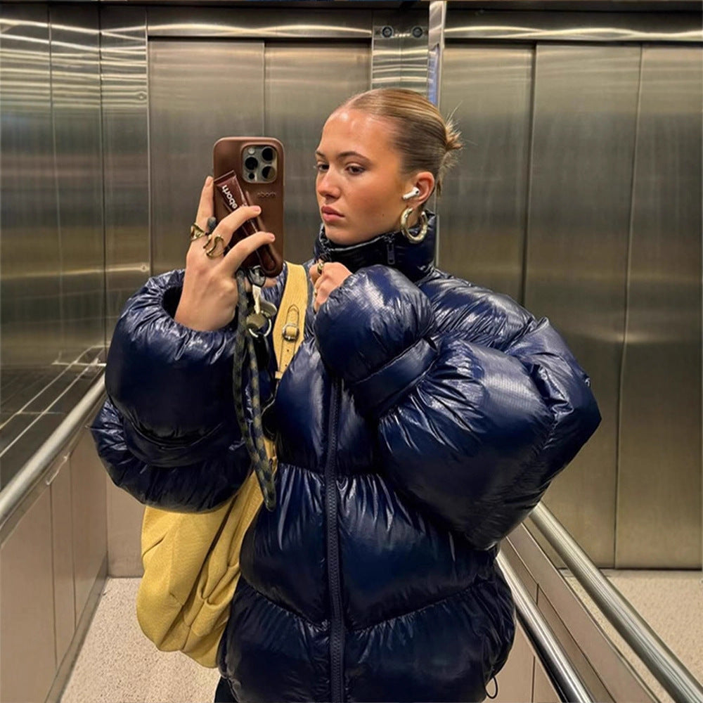 Damen Glänzende Oversize-Steppjacke mit Kapuze und hohem Stehkragen Echoarchiv
