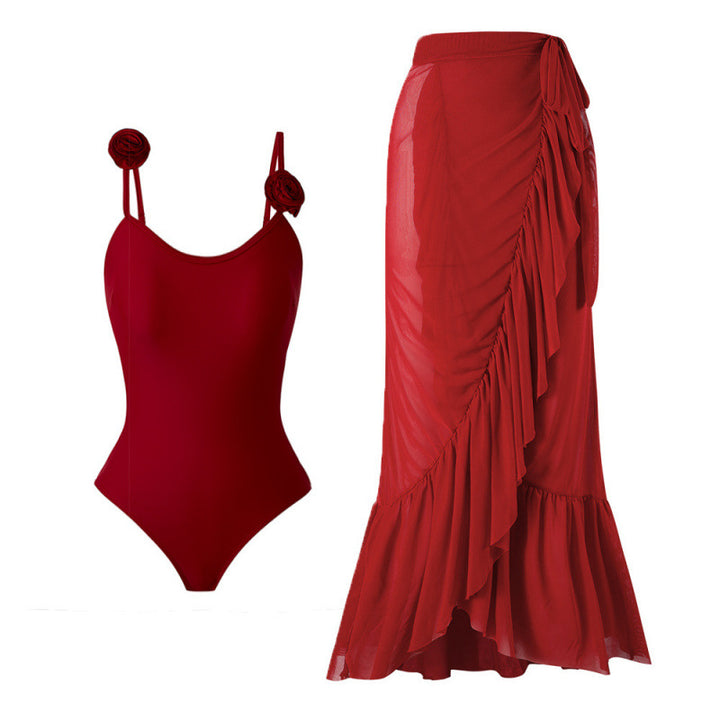 Damen Einteiler Badeanzug mit dekorativen Blumenapplikationen und elegantem Wickelrock Echo Archiv