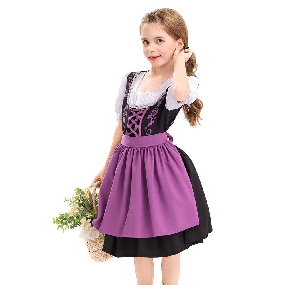 Damen nan traditionelles Kinderdirndl mit geschnürtem Mieder und zweilagiger Schürze Echo Archiv