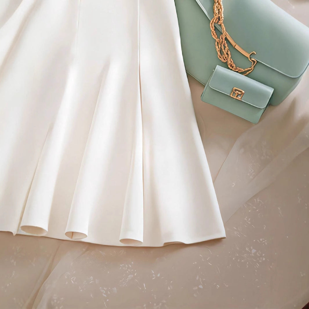 Damen Eleganter Midirock mit Knopfdetails und schwingendem Saum Echo Archiv