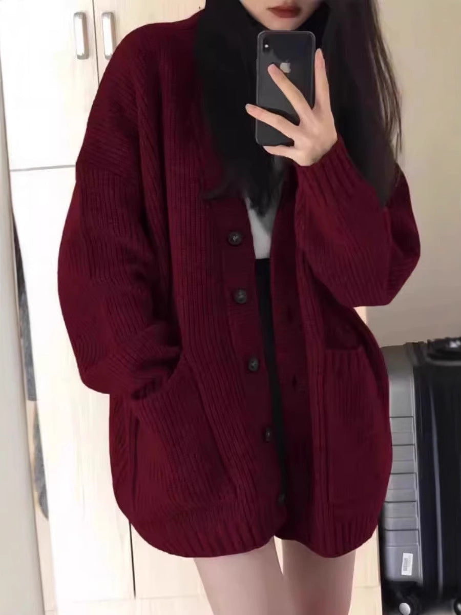 Damen Oversize Strickcardigan mit aufgesetzten Taschen und durchgehender Knopfleiste Echoarchiv