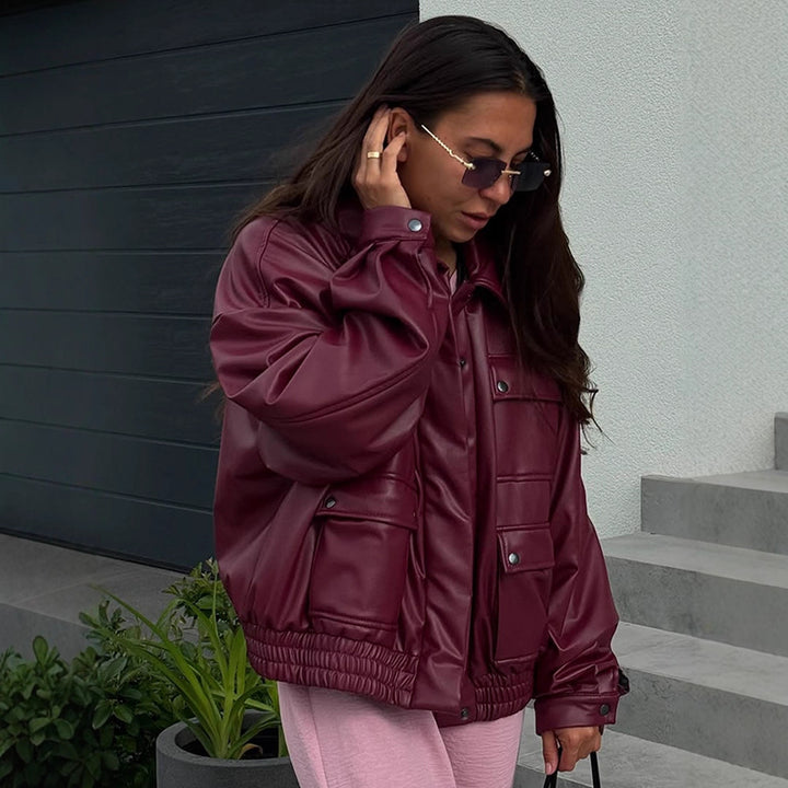Damen Oversize Kunstlederjacke mit aufgesetzten Druckknopf-Taschen und elastischem Saum Echoarchiv