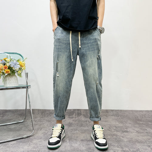 Herren lockere Jeanshose mit Distressed-Optik Echoarchiv