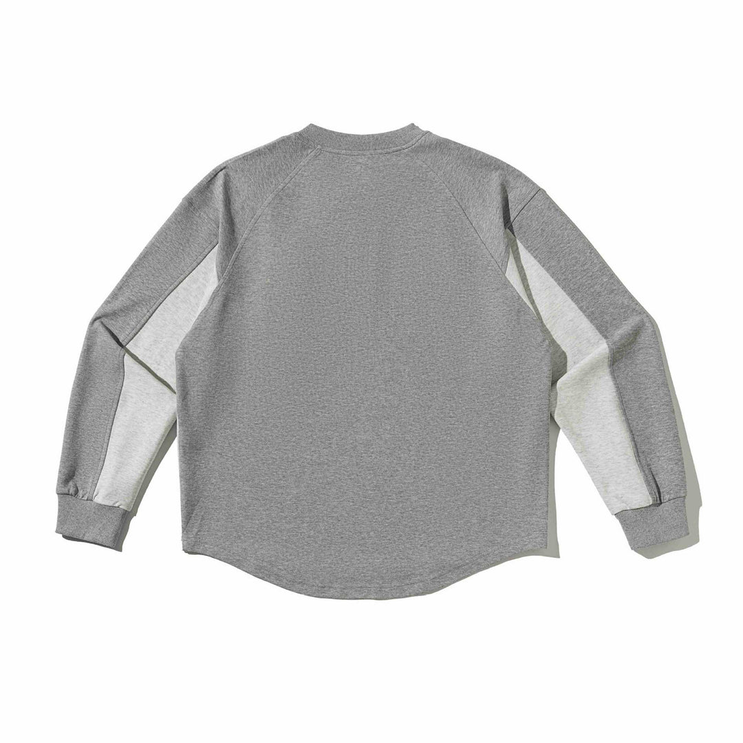 Unisex Raglan‑Sweatshirt mit halbrundem Saum und aufgesetzter Brusttasche Echoarchiv
