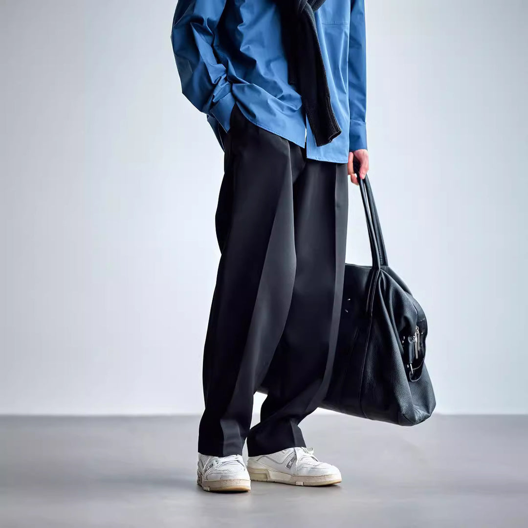 Herren Weite Chino-Hose mit Bundfalten und lockerem Schnitt Echoarchiv