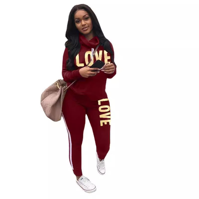 Damen nan sportives Kapuzen-Sweatshirt-Set mit Goldprint und Highwaist-Jogginghose Echo Archiv