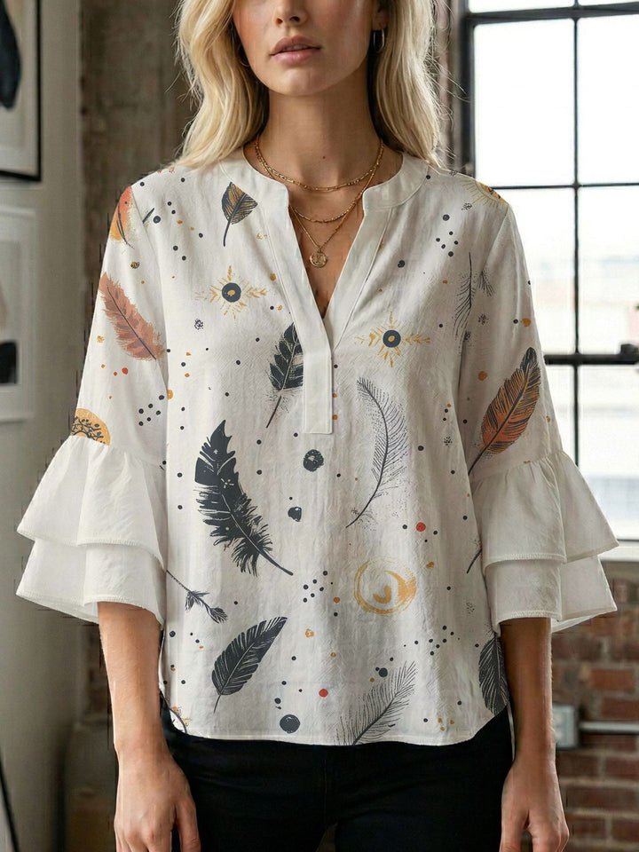 Damen Blusenshirt mit voluminösen Ärmeln und kreativem Druckdesign Echo Archiv