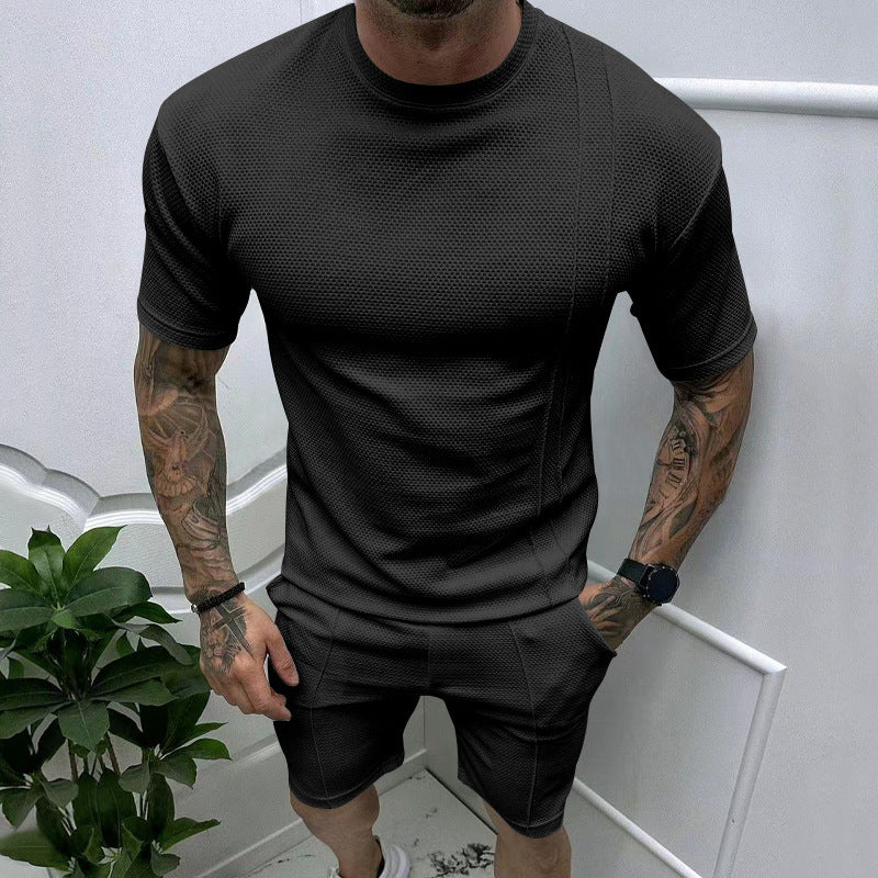 Herren sportliches Kurzarm-Set mit atmungsaktivem Material und funktionalen Details Echoarchiv