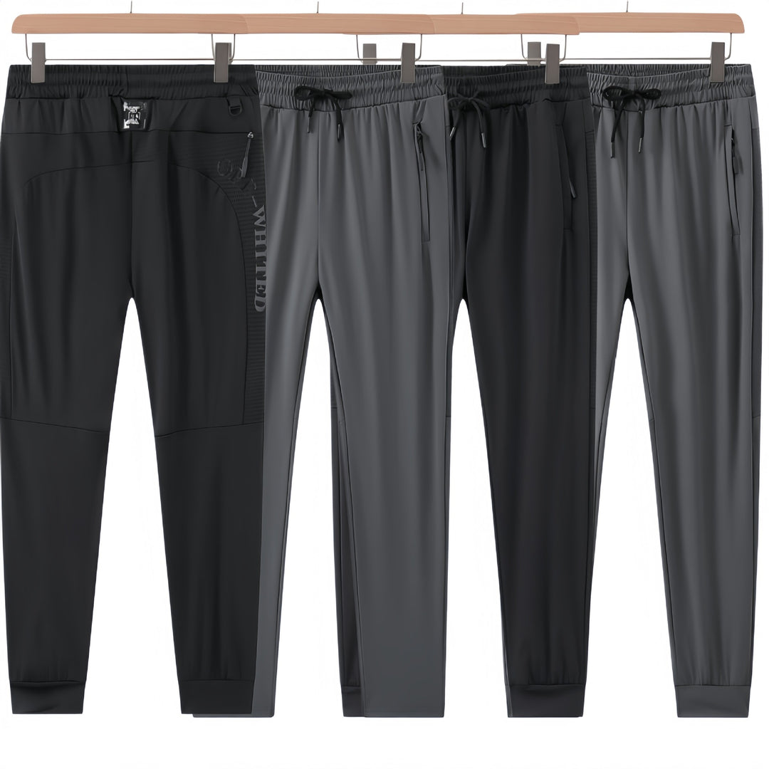 Herren Sportliche Trainingshose mit seitlichen Reißverschlusstaschen Echo Archiv