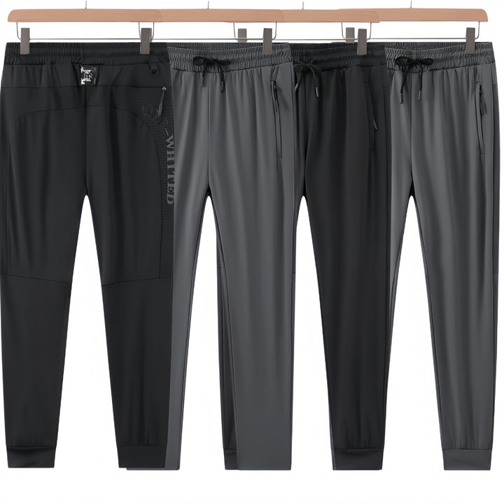 Herren Sportliche Trainingshose mit seitlichen Reißverschlusstaschen Echo Archiv