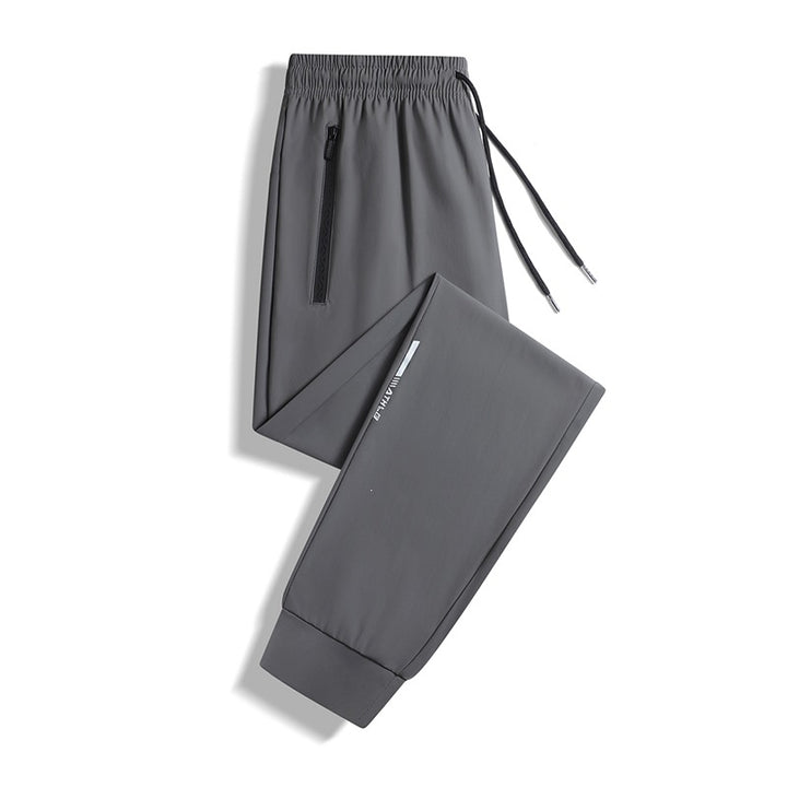 Herren Sportliche Jogginghose mit elastischem Bund und praktischen Reißverschlusstaschen Echo Archiv
