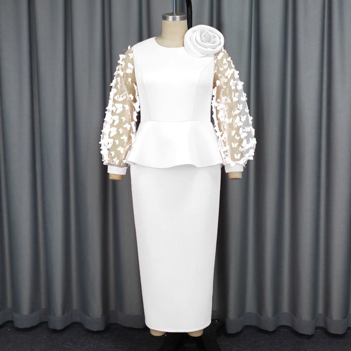 Damen Elegantes Kleid mit extravaganten Puffärmeln und floralem Detail Echo Archiv