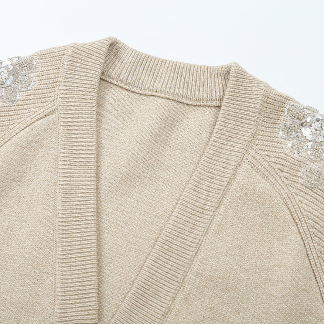 Damen Strick-Midikleid mit tiefem V-Ausschnitt, Taillengürtel und paillettenverzierten Ärmeln Echoarchiv