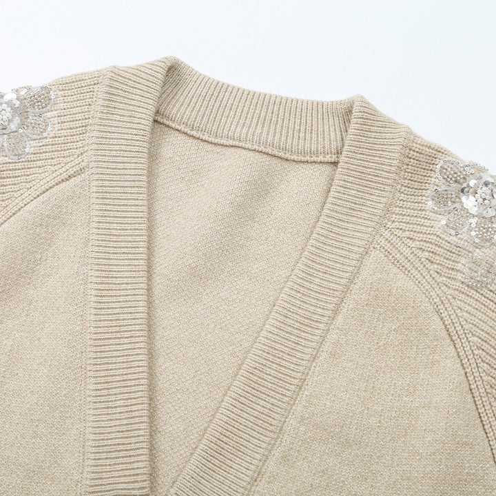 Damen Strick-Midikleid mit tiefem V-Ausschnitt, Taillengürtel und paillettenverzierten Ärmeln Echoarchiv