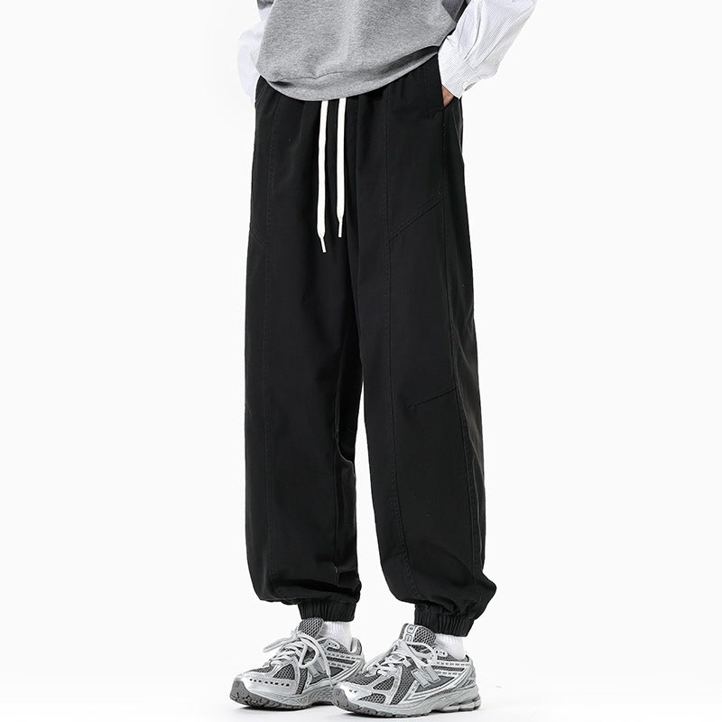 Herren Oversized Utility-Jogginghose aus robustem Baumwollmix mit Kordelbund, seitlichen Cargo‑Taschen & gerippten Bündchen Echoarchiv