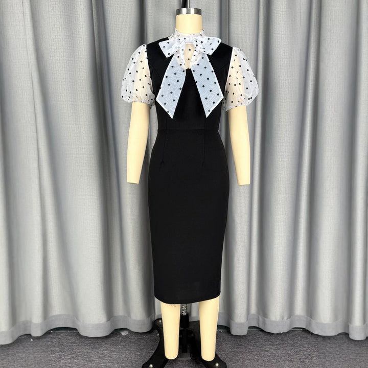 Damen figurbetontes Midi-Kleid mit transparenten Puffärmeln und Schleifenkragen Echo Archiv