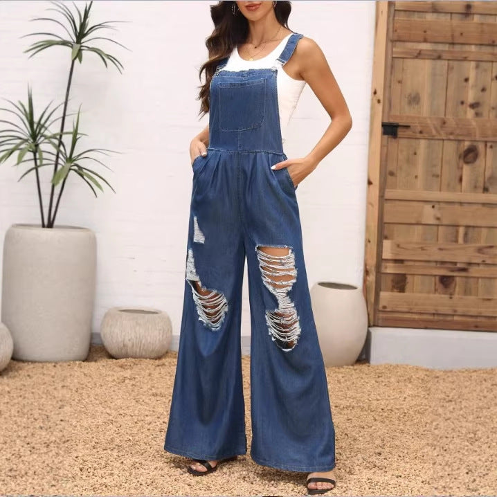 Damen weite Distressed-Latzhose mit verstellbaren Trägern und großen Knie-Rips Echo Archiv