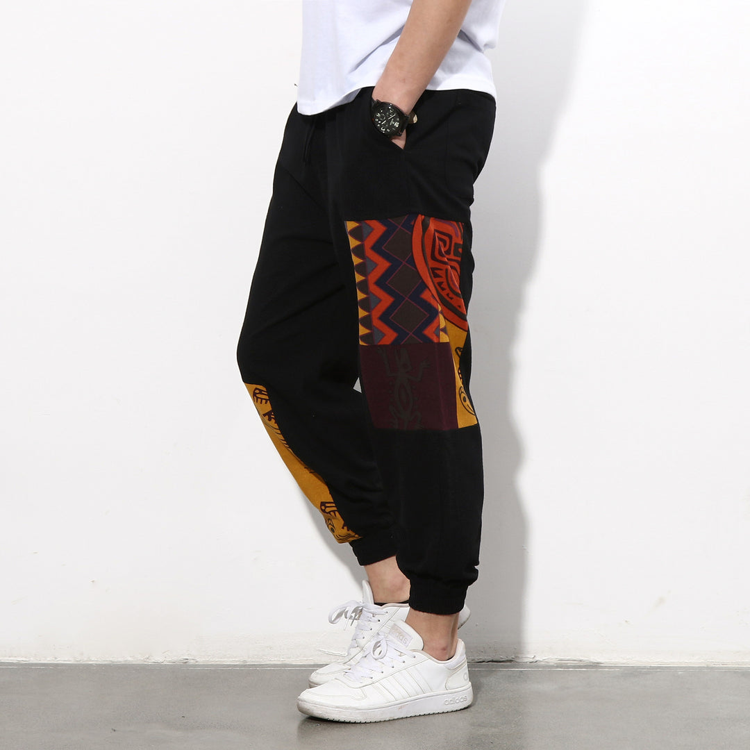 Herren Jogginghose mit seitlichen Panel-Prints, Tunnelzug und gerippten Bündchen Echo Archiv
