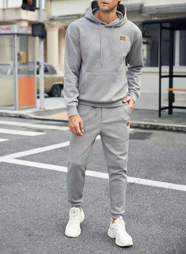 Herren Freizeit-Jogginganzug mit strukturiertem Design und praktischen Taschen Echoarchiv
