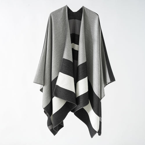 Damen Oversize-Ruana im Cape‑Stil aus Wolloptik mit geometrischen Blockstreifen Echo Archiv