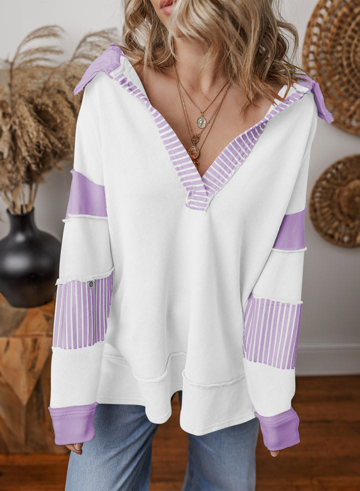 Damen Oversize Sweatshirt mit V-Ausschnitt, gestreiften Ärmelaufsätzen und Kontrastdetails – Mavelle