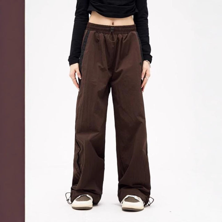 Damen nan weite Trackhose mit Kontrastpaspel, elastischem Bund und Oversize-Schnitt Echo Archiv