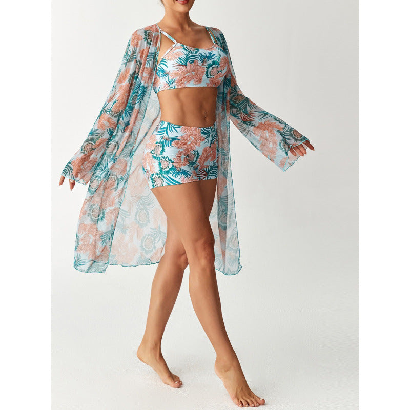 Damen Strandüberwurf mit floralem Design und hohem Schnitt Echo Archiv