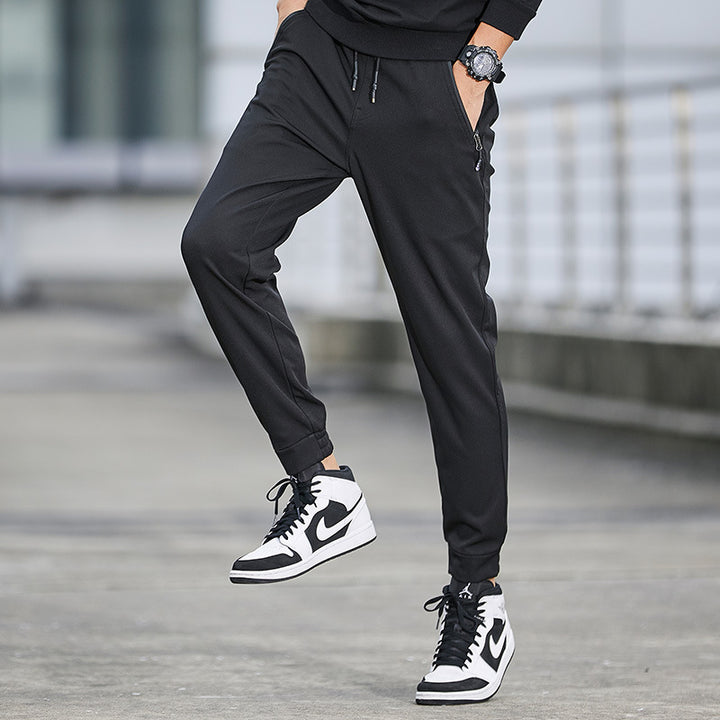 Herren Technische Softshell-Jogginghose mit wasserabweisender Membran, Reißverschlusstaschen und elastischem Kordelbund Echo Archiv