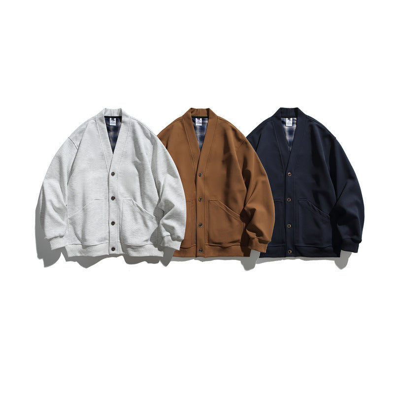 Unisex Oversize-Cardiganjacke aus schwerem French-Terry mit V-Ausschnitt und aufgesetzten Eingrifftaschen Echoarchiv