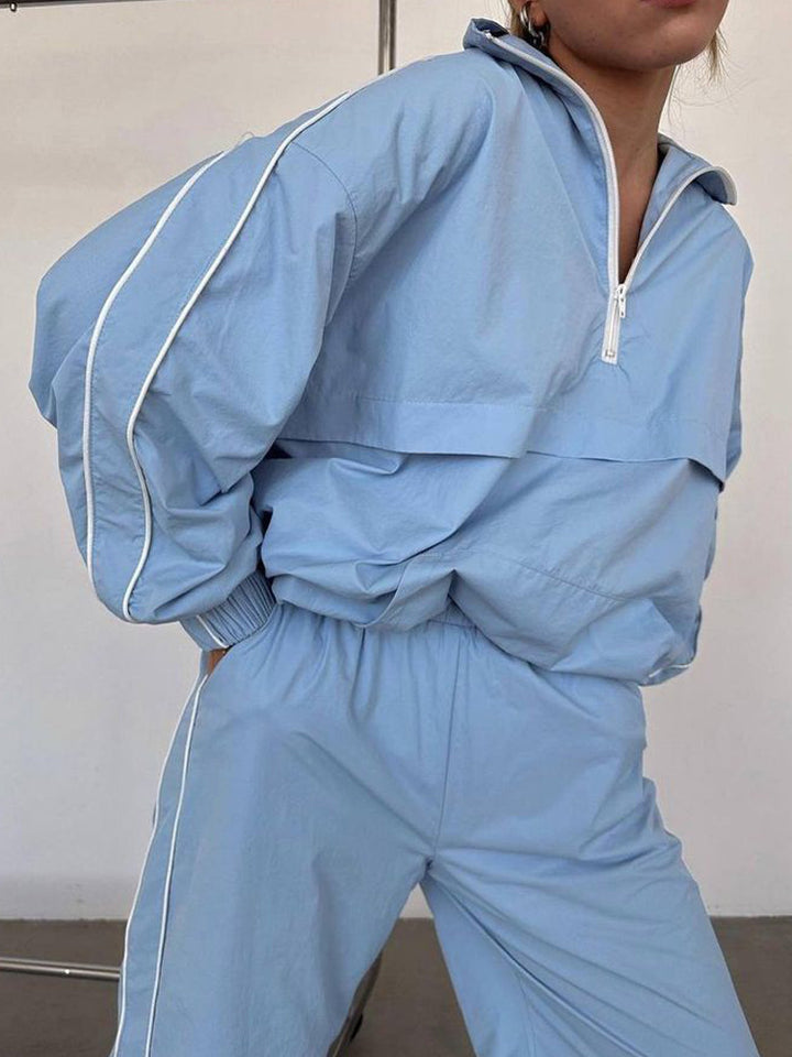 Damen Zweiteiliges Sportliches Jogging-Set mit halbem Reißverschluss, Paspelierung und elastischer Bundhose – Avérine