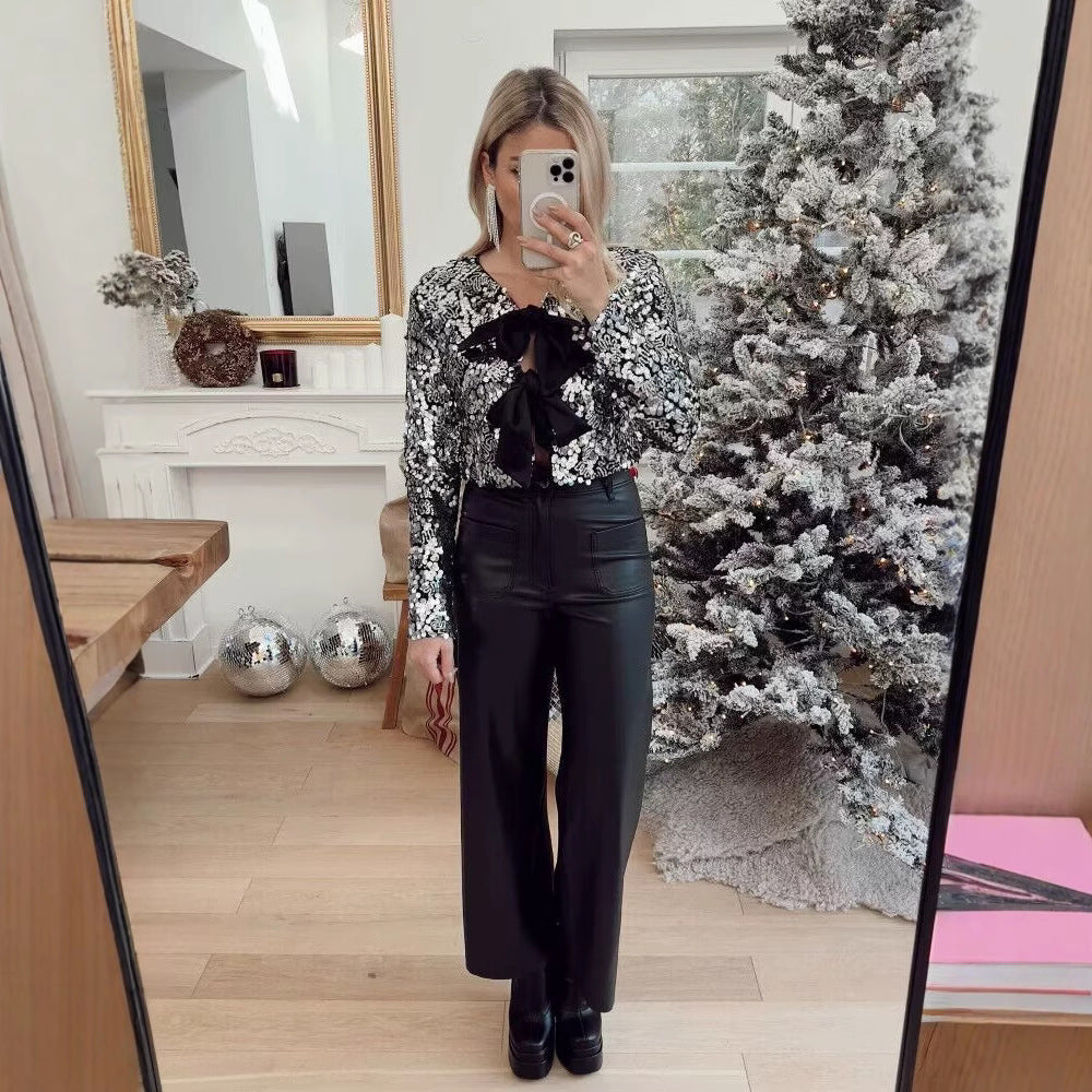 Damen Kurzjacke mit Paillettenbesatz und Zierschleifen-Front Echo Archiv