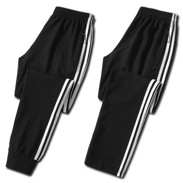 Herren Slim-Fit Trackhose mit seitlichen Kontraststreifen, Reißverschlusstaschen und elastischem Bund – Sorevano