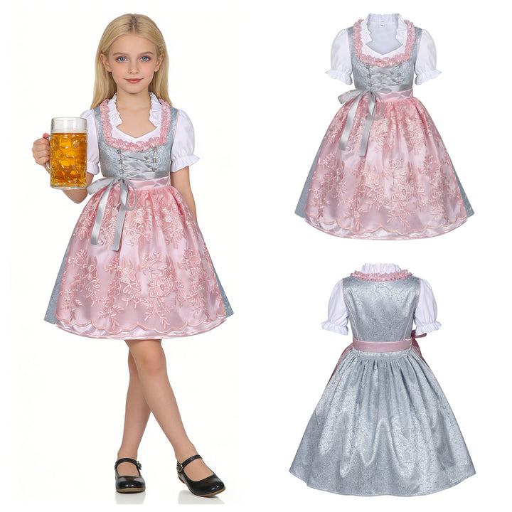Damen nan traditionelles Kinderdirndl mit bestickter Schürze und Rüschenbluse Echo Archiv