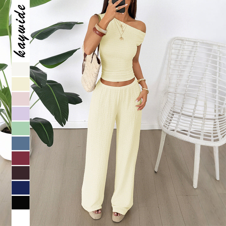 Damen Zweiteiliges Set aus elastischem Rippstoff mit asymmetrischem Top und weitem Hosen Echo Archiv