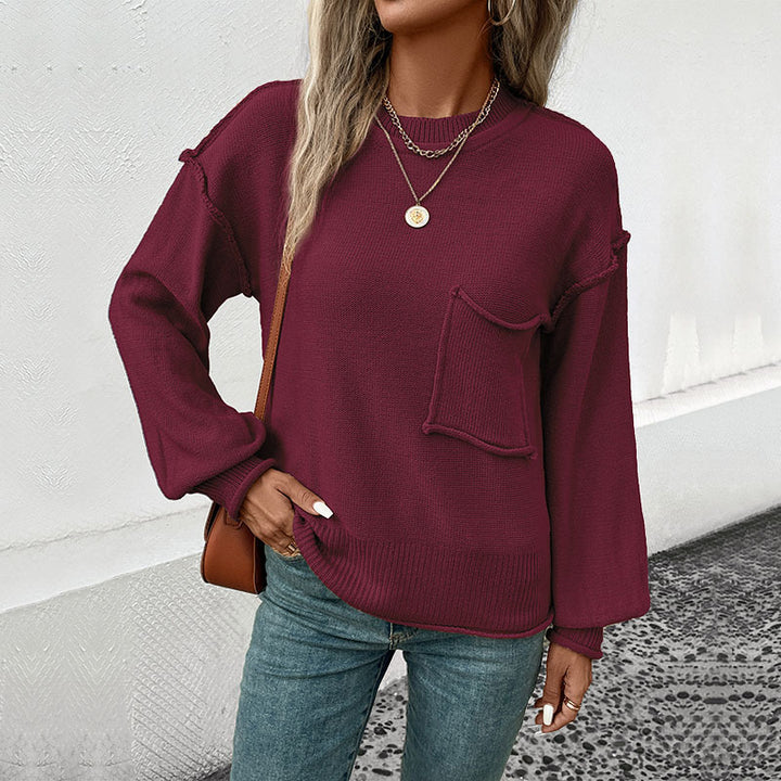 Damen Oversize Rundhals-Strickpullover mit aufgesetzter Brusttasche und fransiger Saumnaht Echoarchiv