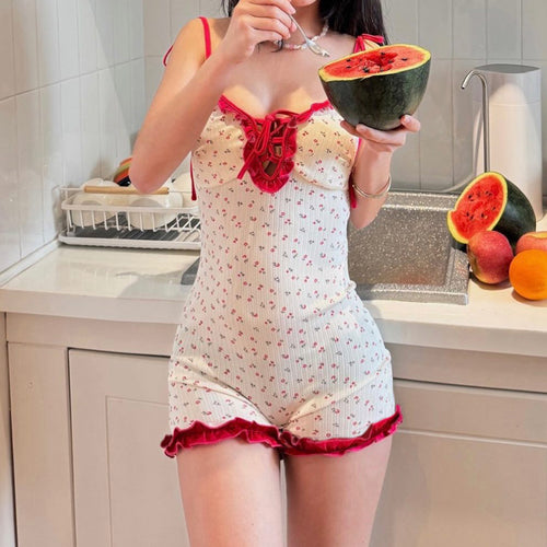 Damen verspielter Jumpsuit mit floralen Akzenten und Rüschendetails Echo Archiv