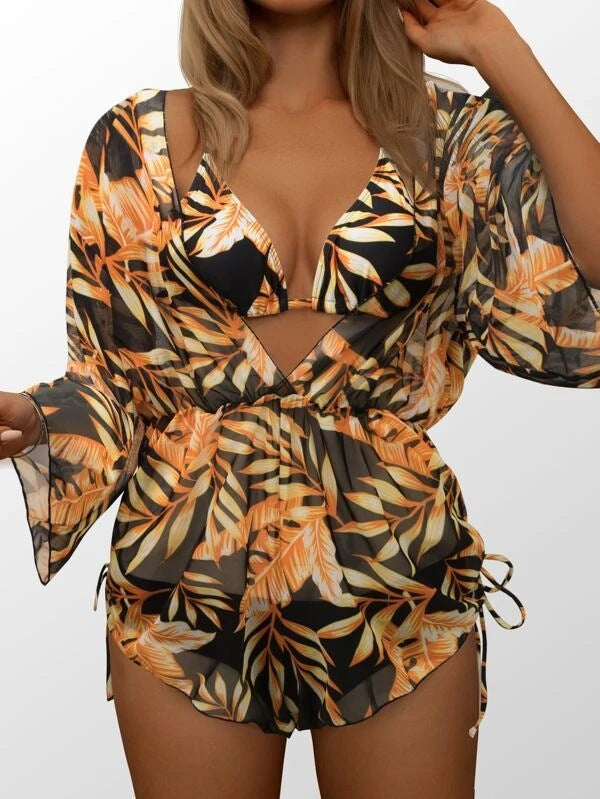 Damen Strandkleid mit floralem Muster und luftigen Ärmeln Echo Archiv