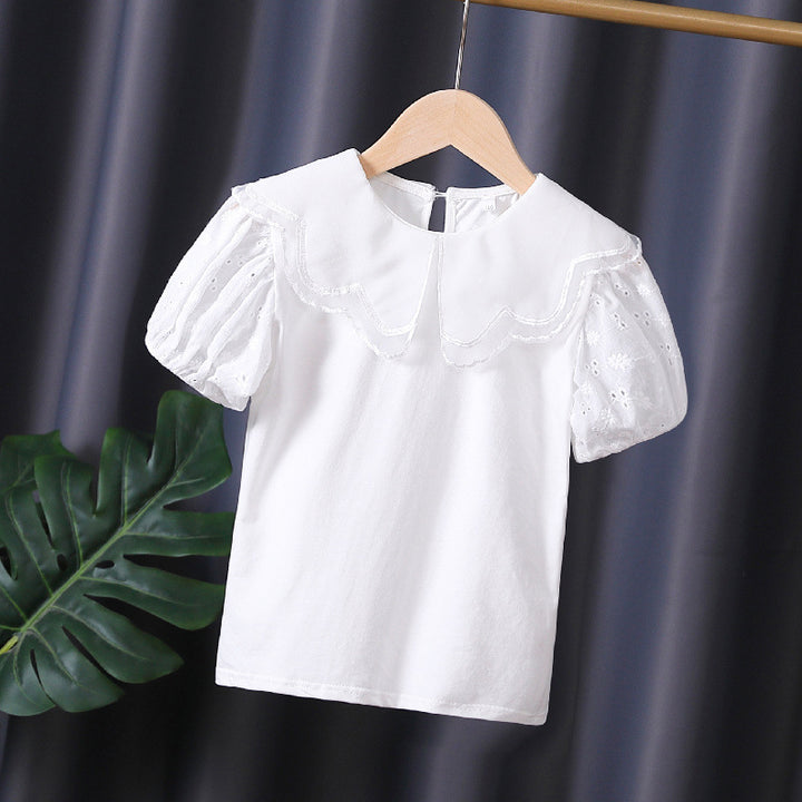 Mädchen Bluse mit dekorativen Lochstickereien und voluminösen Puffärmeln Echo Archiv