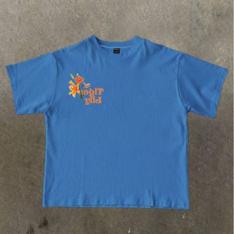 Damen T-Shirt mit künstlerischem floralem Druck und verspieltem Schriftzug Echo Archiv