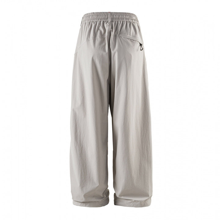 Unisex Weitgeschnittene technische Cargo-Hose mit Gummibund, Kordelzug und Reißverschlusstaschen Echo Archiv