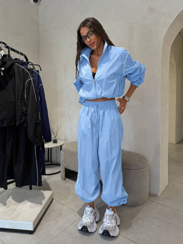 Damen Kurzgeschnittenes Windbreaker-Set mit weiter Trackhose und Kontrastpaspel Echoarchiv