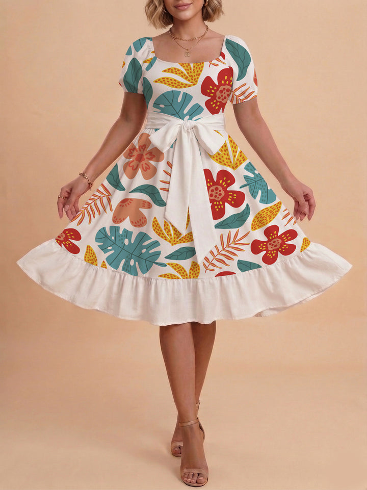 Damen Sommerliches Blumenkleid mit taillierbarem Gürtel und voluminösen Ärmeln Echo Archiv