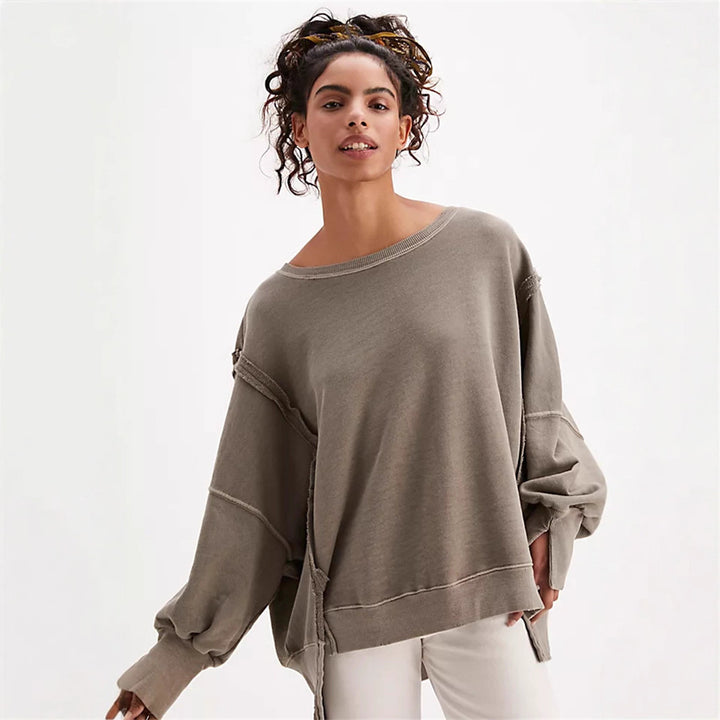 Damen oversized Sweatshirt mit Ballonärmeln, offenen Saumnähten und seitlichen Schlitzen – Avérine