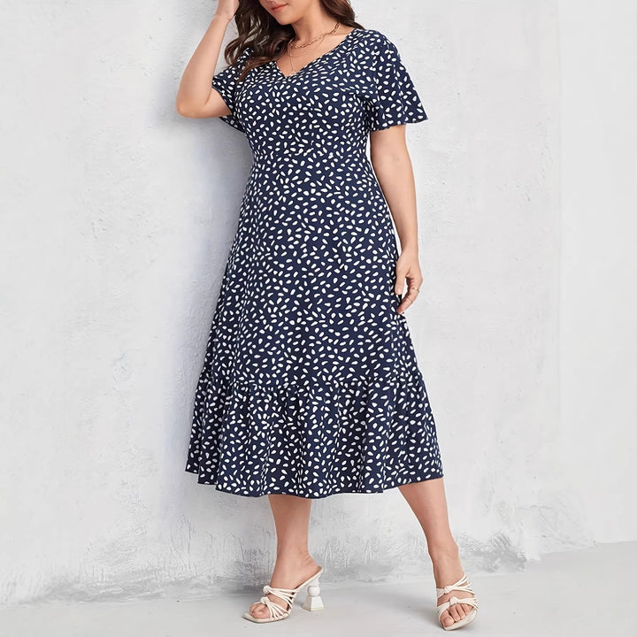 Damen Midi-Kleid mit fließendem Schnitt und verspieltem Muster Echo Archiv