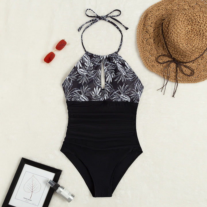 Damen Eleganter Badeanzug mit tiefem Ausschnitt und floralem Design Echo Archiv