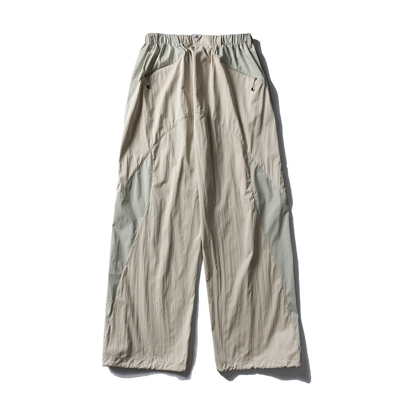 Herren Weite technische Nylon-Cargohose mit elastischem Bund und Paneel-Details Echoarchiv