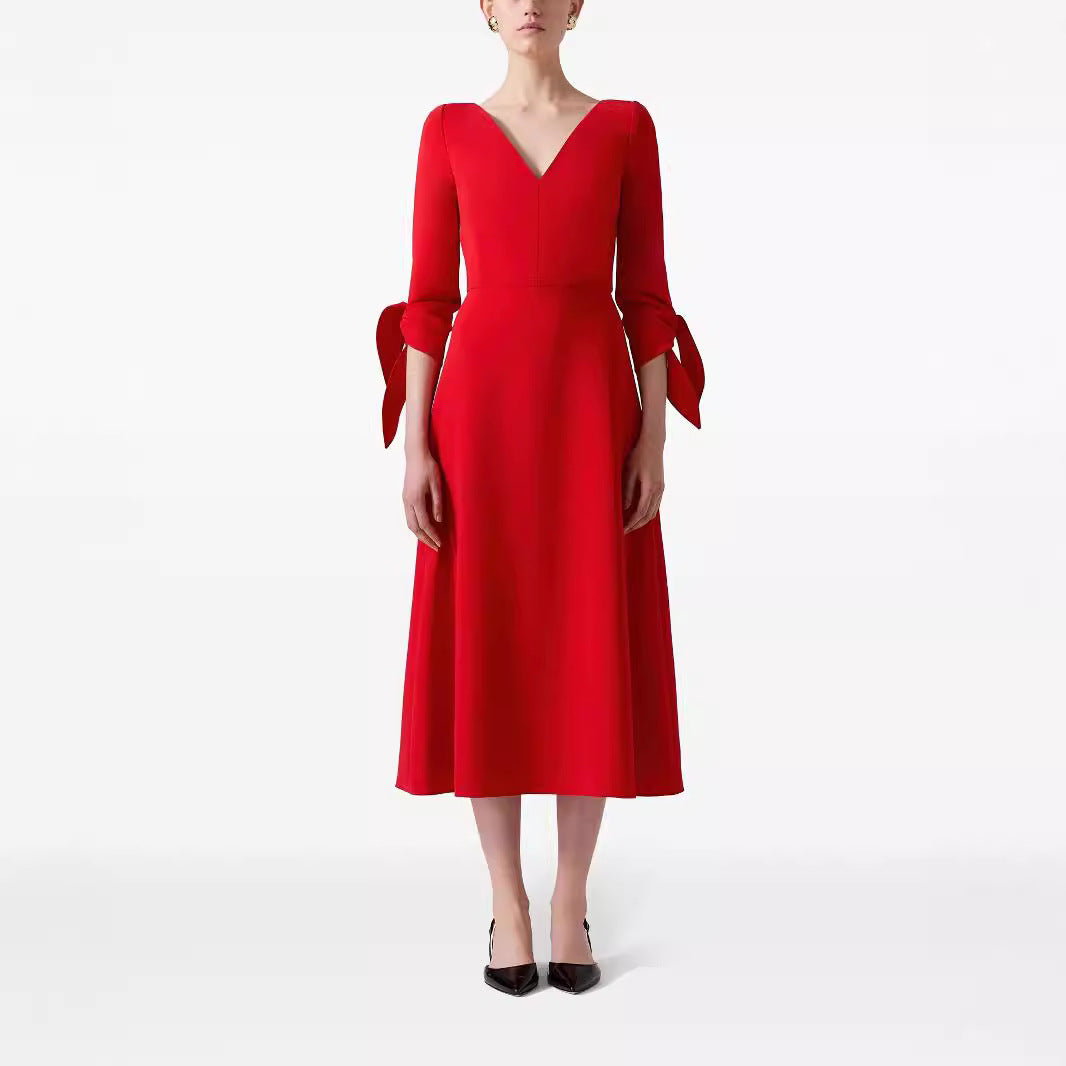 Damen Tailliertes Midikleid mit V-Ausschnitt und Schleifenmanschetten Echoarchiv
