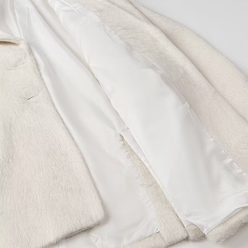 Damen nan minimalistischer midilanger Mantelblazer mit strukturierter Oberfläche, Reverskragen und Pattentaschen Echo Archiv